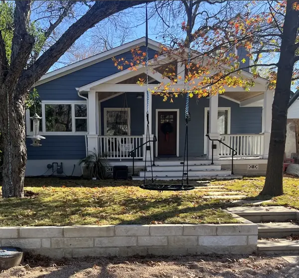 Front porch remodel on a blue home, Austin area
